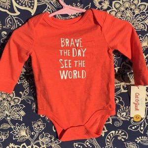 Tangerine long sleeve onesie